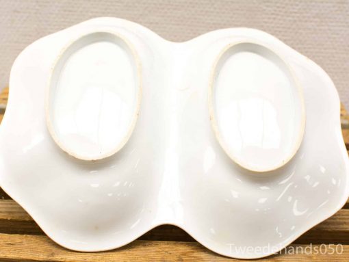 Elegant vintage porcelain butterfly dish, perfect for serving and decoration in timeless style.