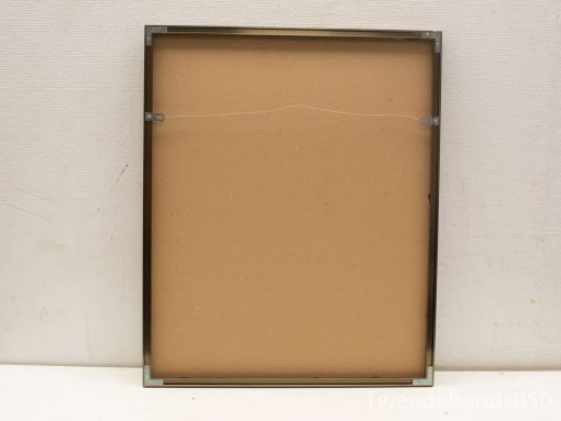 Sleek modern metal photo frame back design with rounded corners and sturdy wall-hanging wire.
