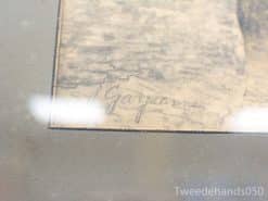Intricate artwork featuring the elegant signature of artist G. Gayanne, showcasing history and creativity.