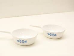 Elegant porcelain bowls with blue floral design, ideal for sauces and dips.