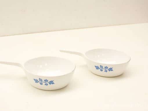 Elegant porcelain bowls with blue floral design, ideal for sauces and dips.