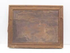 Vintage wooden frame with a rich patina, showcasing history and classic craftsmanship.