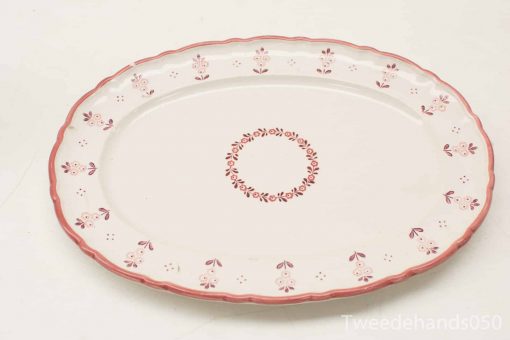 Elegant vintage oval platter with delicate pink floral design for special occasions.