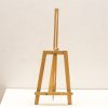 Rustic wooden easel with paint splatters, adjustable height, perfect for artists creative projects.