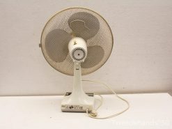Classic retro electric fan in white with metallic blades, perfect for home or office use.