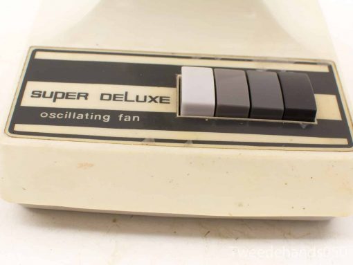 Vintage oscillating fan with creamy white finish, SUPER DeLUXE brand, perfect for classic decor.