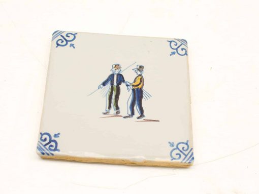 Antique-style decorative tile featuring vibrant figures with sparklers in a festive scene.