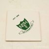 Ceramic tile commemorating 85 years of Nij. Groeningen with a green NVH emblem.
