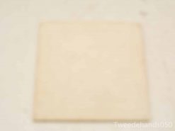 High-quality neutral beige square piece with subtle texture for minimalist decor and creativity.