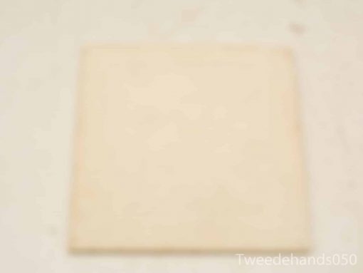High-quality neutral beige square piece with subtle texture for minimalist decor and creativity.