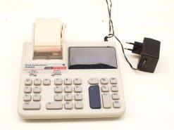 Vintage Texas Instruments TI-503II calculator with built-in printer, ideal for finance and collectors.