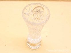 Elegant handmade crystal vase with intricate cut patterns, perfect for timeless decor.