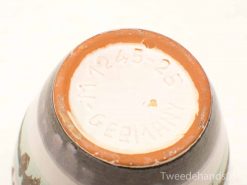 Handmade ceramic vase by W. Gebimann with unique textures and charming signs of age.