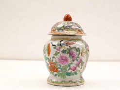 Chinese porcelain jar with floral design, perfect for collectors and elegant home décor.