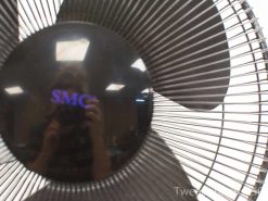 Industrial SMC fan with vintage charm, sleek design, and efficient airflow for modern spaces.