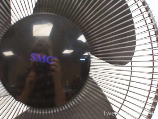 Industrial SMC fan with vintage charm, sleek design, and efficient airflow for modern spaces.