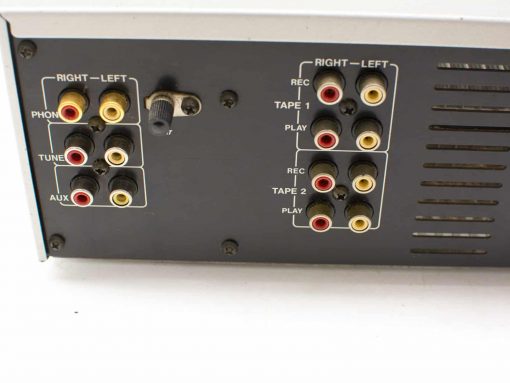 Vintage Akai stereo receiver with RCA inputs for versatile audio connectivity and classic design.
