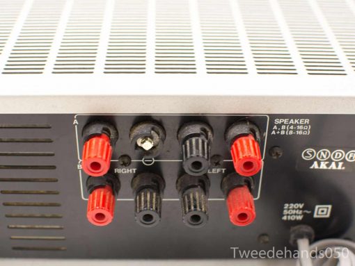 Vintage Akai stereo amplifier with multiple speaker options and clear connectivity for optimal audio setup.