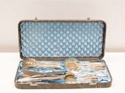 Elegant vintage silverware set in a stylish carrying case, perfect for collectors and fine dining.
