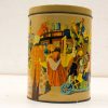 Vibrant vintage tin container featuring a lively historical market scene with colorful figures.