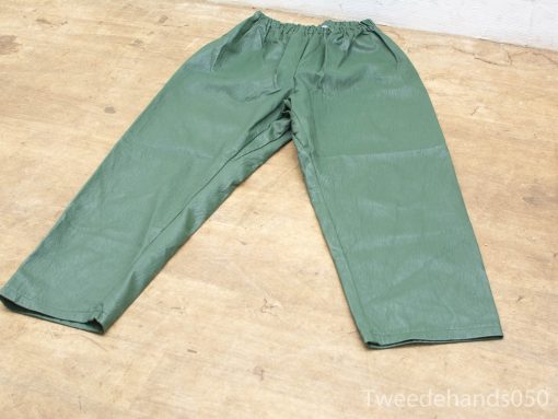 Comfortable green outdoor pants with elastic waistband; perfect for hiking and casual activities.