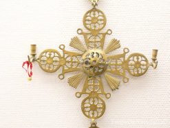 Antique brass Byzantine cross with intricate designs, perfect for ceremonial use or decoration.