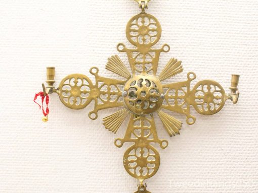 Antique brass Byzantine cross with intricate designs, perfect for ceremonial use or decoration.