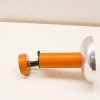 Sleek orange tool with silver accents; versatile, stylish, and functional for everyday use.