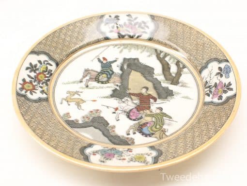 Vibrant decorative plate featuring hunting theme with floral border, ideal for collectors and art enthusiasts.