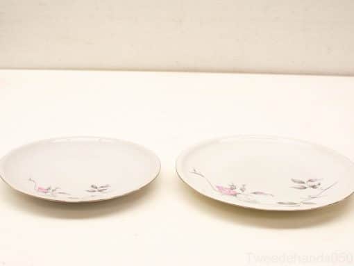 Elegant porcelain plates with delicate floral designs, perfect for any dining occasion.
