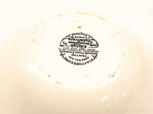 Vintage white ceramic bowl by Stavroborosht, featuring elegant patterns and functional design.