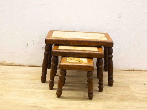 Elegant wooden nesting tables set, perfect for stylish and functional living space decoration.