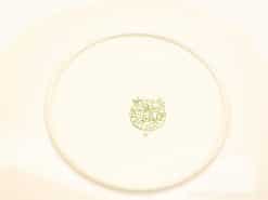 Elegant vintage ceramic plate from Boch, Belgium, featuring a glossy beige finish and classic design.
