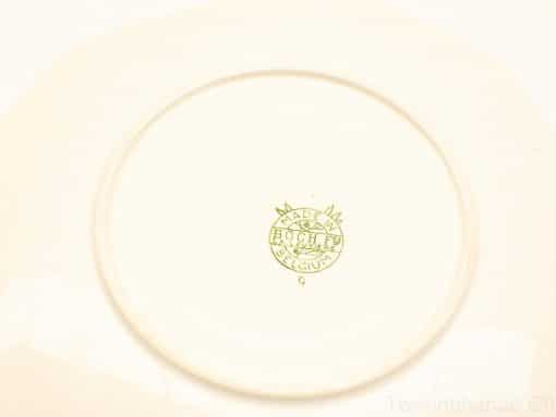 Elegant vintage ceramic plate from Boch, Belgium, featuring a glossy beige finish and classic design.