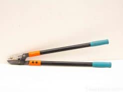 Durable pruning shears with ergonomic turquoise grips and sharp blade for precise cutting.