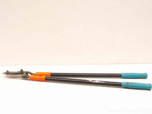 Durable loppers with ergonomic handles for efficient pruning and garden maintenance.