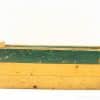 Vintage wooden crate in green and yellow, perfect for storage or rustic decor.