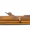 Vintage wooden hand plane showcasing craftsmanship, character, and rich history in woodworking.