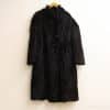 Elegant vintage black fur coat, XL, with a refined silhouette and luxurious sheen.