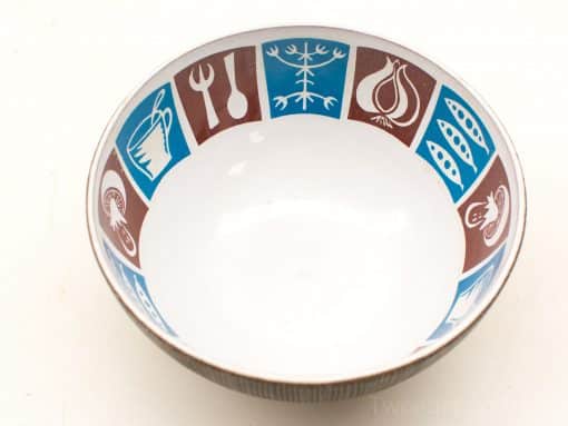 Charming ceramic bowl with vibrant geometric patterns, perfect for modern kitchens and festive dining.