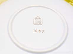 Elegant decorative plate by Flora Keramiek, Gouda; model 1063 with gold crown logo.