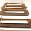 Rustic vintage C-clamps set of 4 for woodworking and metalworking enthusiasts.