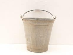 Classic galvanized metal bucket with handle, perfect for gardening and everyday tasks.