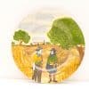 Charming decorative plate featuring a vibrant rural scene with farmers and golden fields.