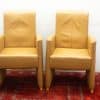 Twee leren eetkamerstoelen fauteuils  22550