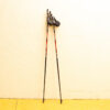 Sleek black and red trekking poles for comfort, traction, and outdoor adventures.