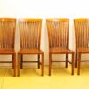 Elegant wooden chairs with slatted backs, perfect for dining or cozy spaces.