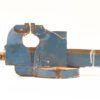 Vintage blue bench vise with rust and wear, showcasing durability and craftsmanship.