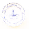 Elegant porcelain plate with sailboat scene and intricate blue floral designs. Perfect for collectors.