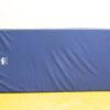 Deep blue Dabron gymnastics mat, high-quality, well-maintained, ideal for safe training activities.